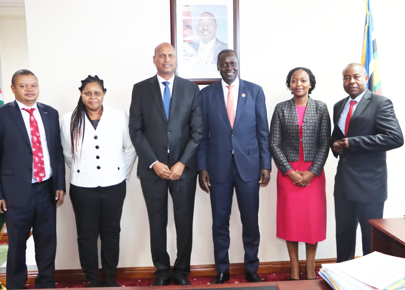 Principal Secretary State Department for Shipping and Maritime Affairs Mr. Aden Millahin the middle, posing for a photo with Kenya's High Commissioner to the United Kingdom and Northern Ireland Amb. Maurice Makoloo after the ambassador paid a courtesy call to the PS.